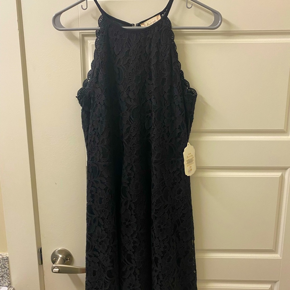 Altard state brand new black lace dress. High neck and above the knee cut.